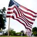 An American Flag is planted in the ground at Arborcrest Memorial park on Sunday, May 26. Daniel Brenner I AnnArbor.com